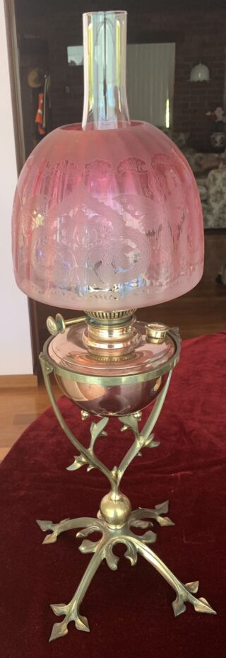 W.A.S. Benson and Sons marked oil lamp cranberry optic shade